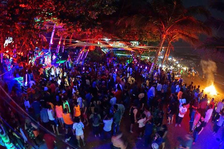 3. Curlies Goa – The Iconic Beach Party Experience